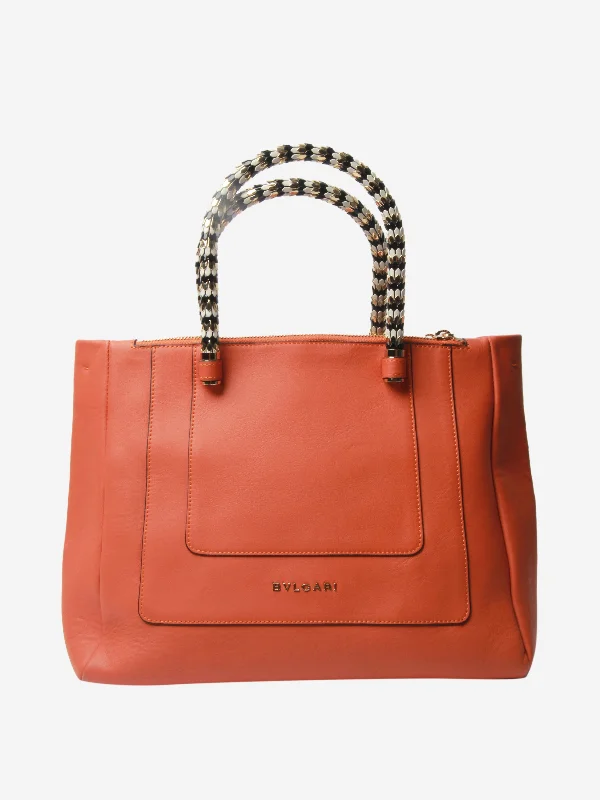 Orange leather top handle bag